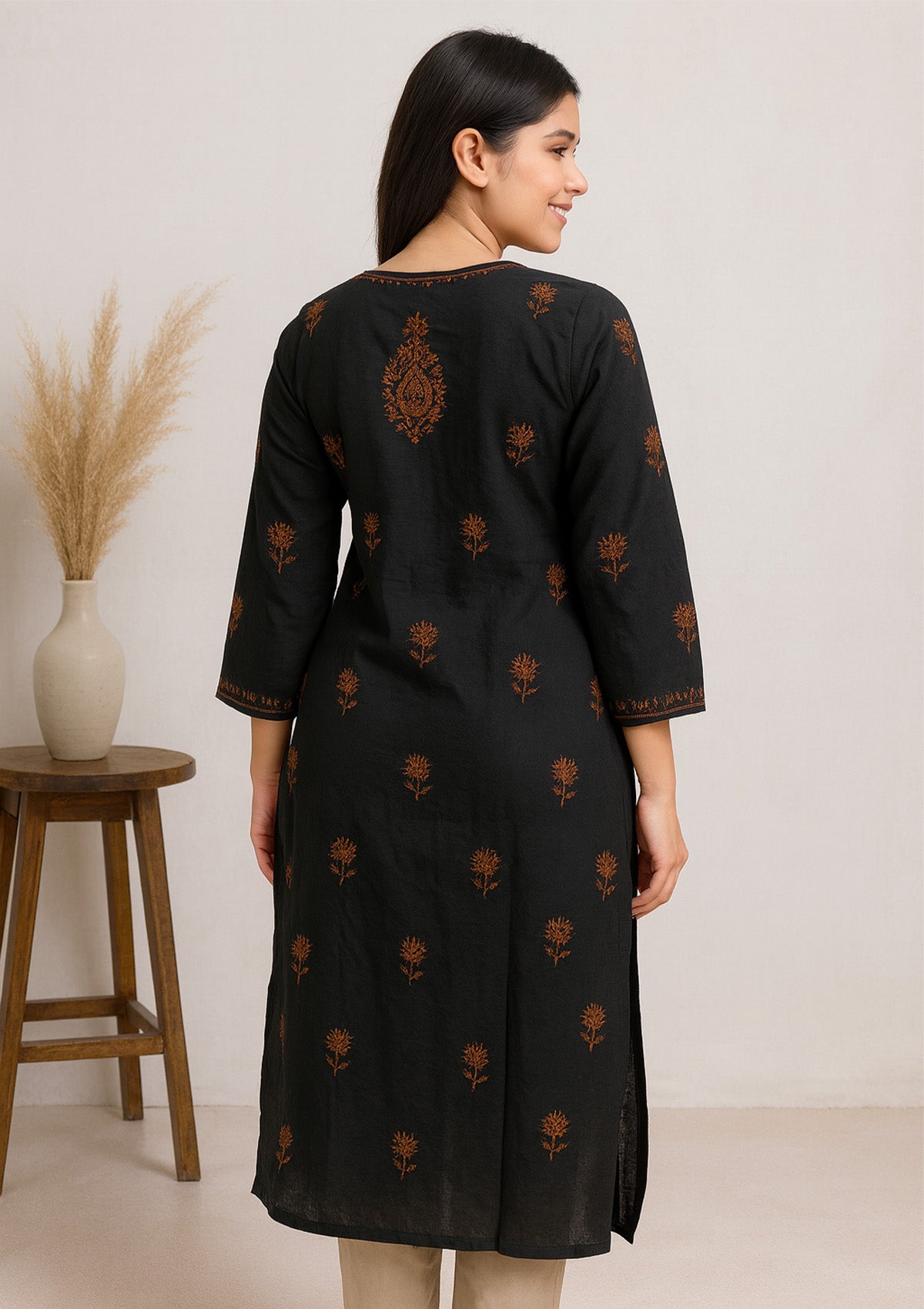 ClothingSutra Black Cotton Embroidered Kurti – Elegant Paisley Design