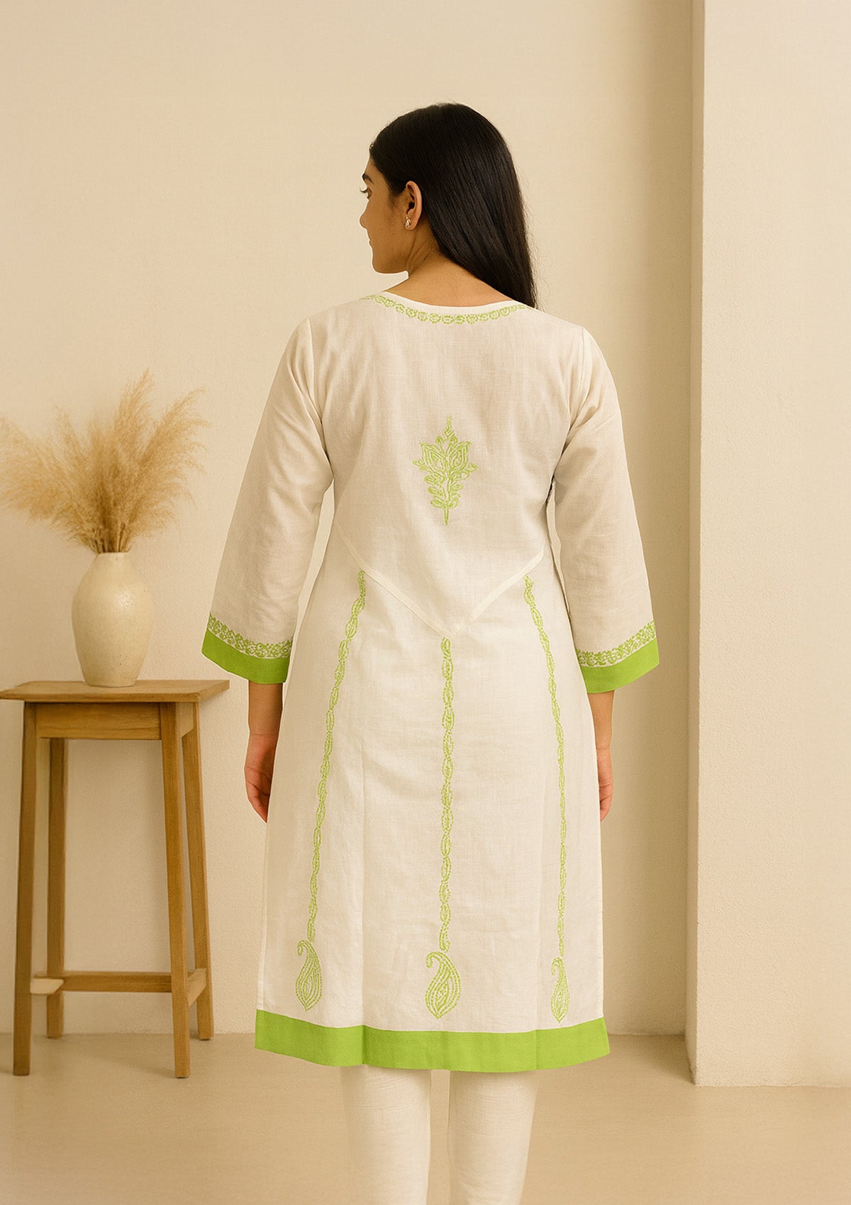 ClothingSutra Elegant White Cotton Kurti with Green Embroidery Detailing